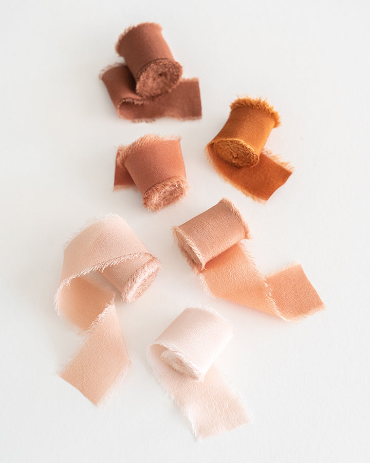Tono + co Limited Edition 'The Color Orange' in Classic Silk Ribbon. View the new fall favorites featuring Champagne + Terra Cotta + Rust, lovingly hand-dyed in Santa Ana, California. Check out our website for more color, wedding, and styling inspiration.